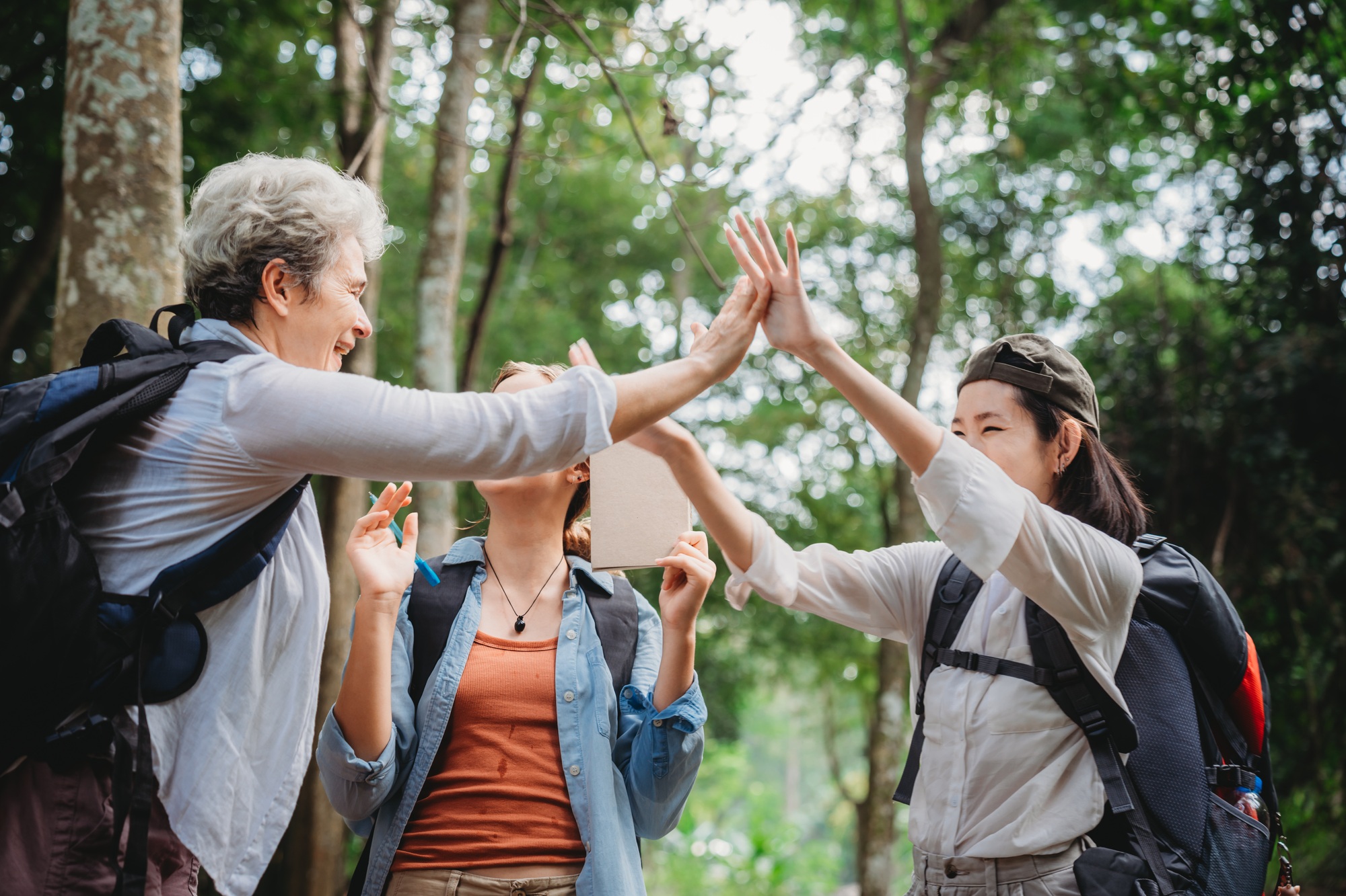 woman family or friends group trekking travel in adventure lifestyle, nature hiking in vacation